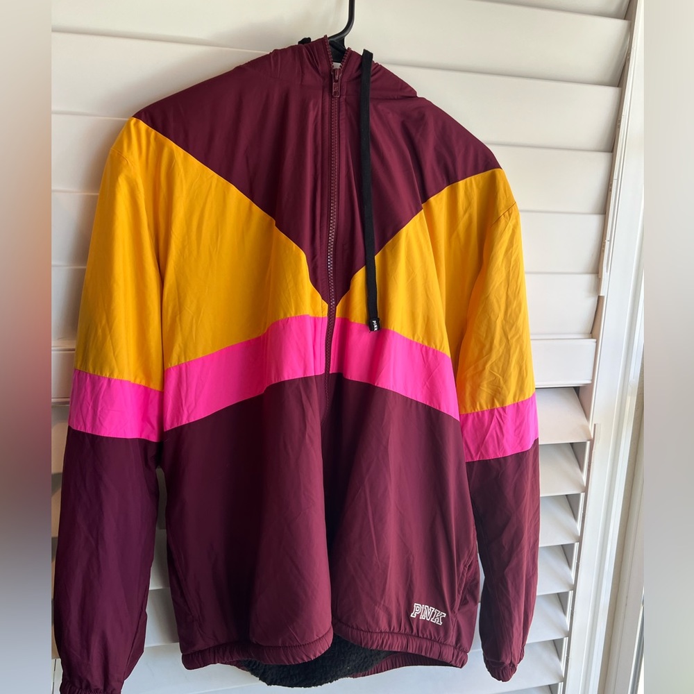 Women’s PINK multi colored Sherpa lined jacket with a hoodie